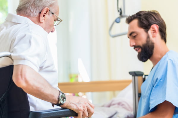 bigstock elderly care nurse helping sen 243777571